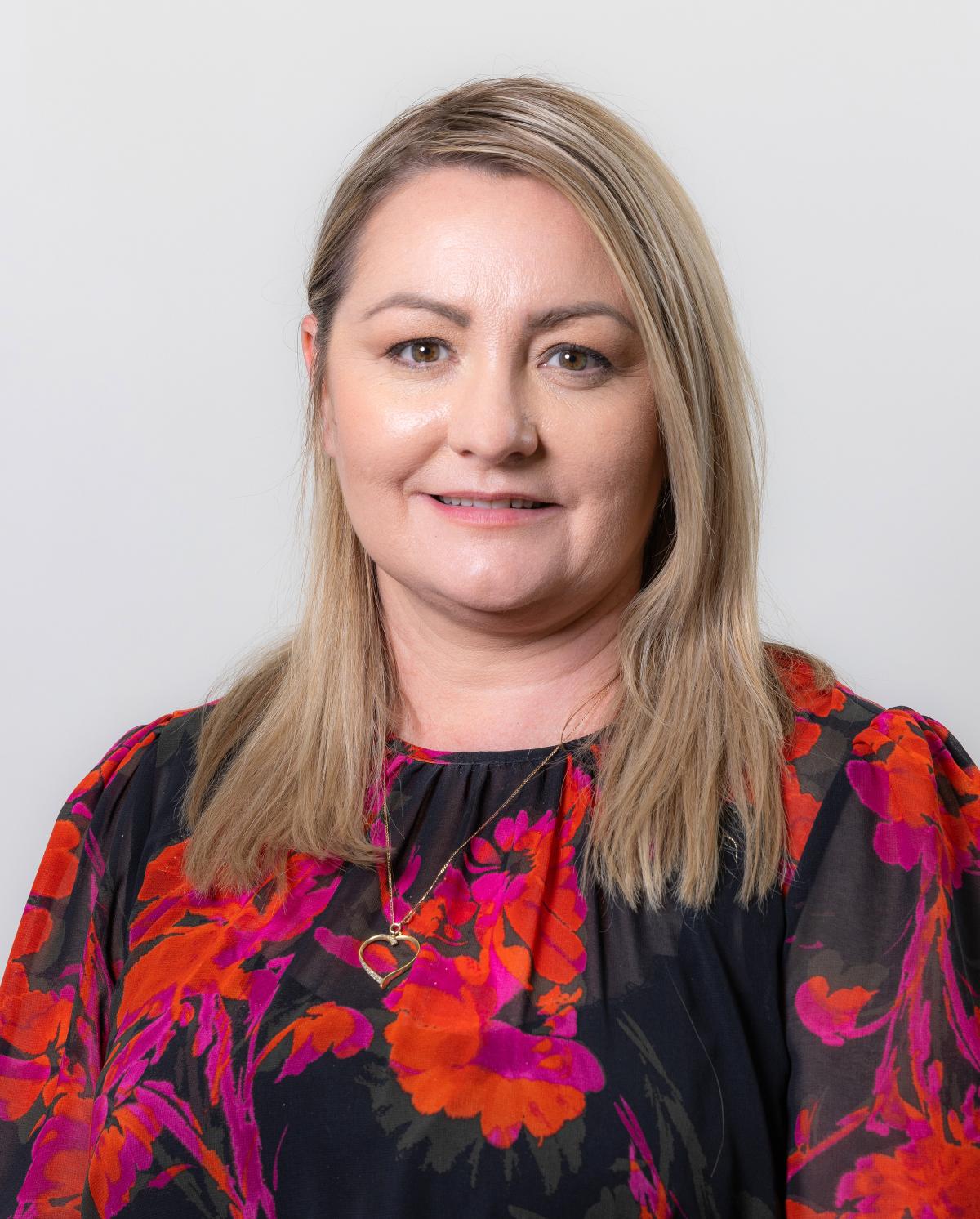 Headshot of Sarah-Jane McGrath.